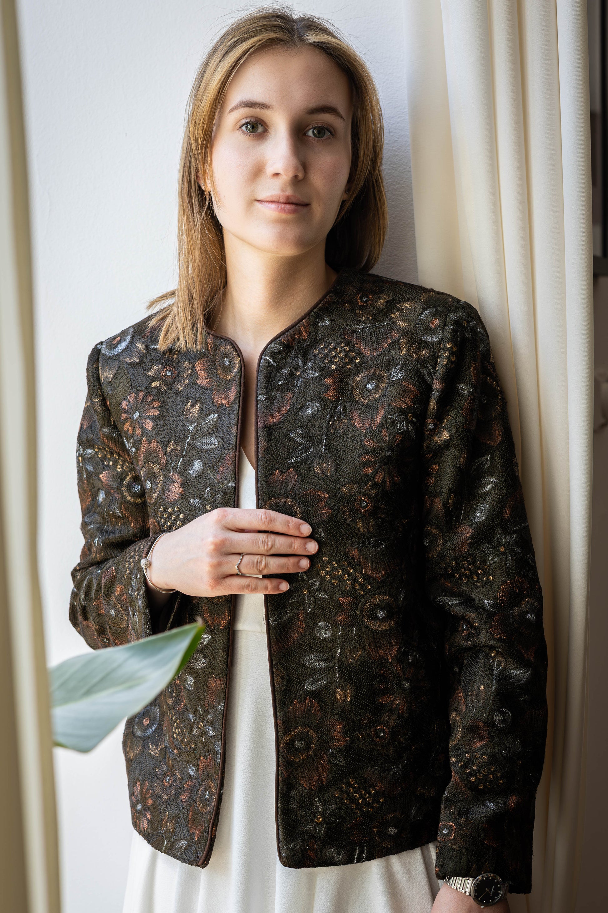 Model wearing handcrafted Aari embroidered jacket in pure silk – STOVARIA