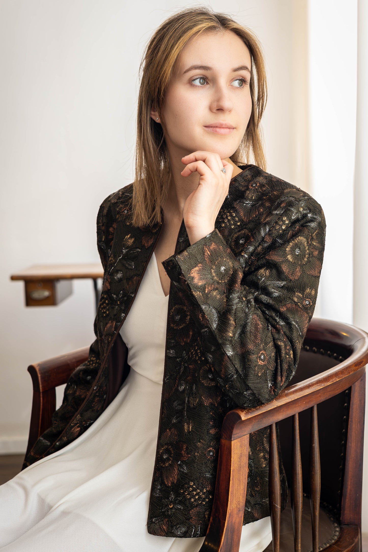 Model wearing handcrafted Aari embroidered jacket in pure silk – STOVARIA