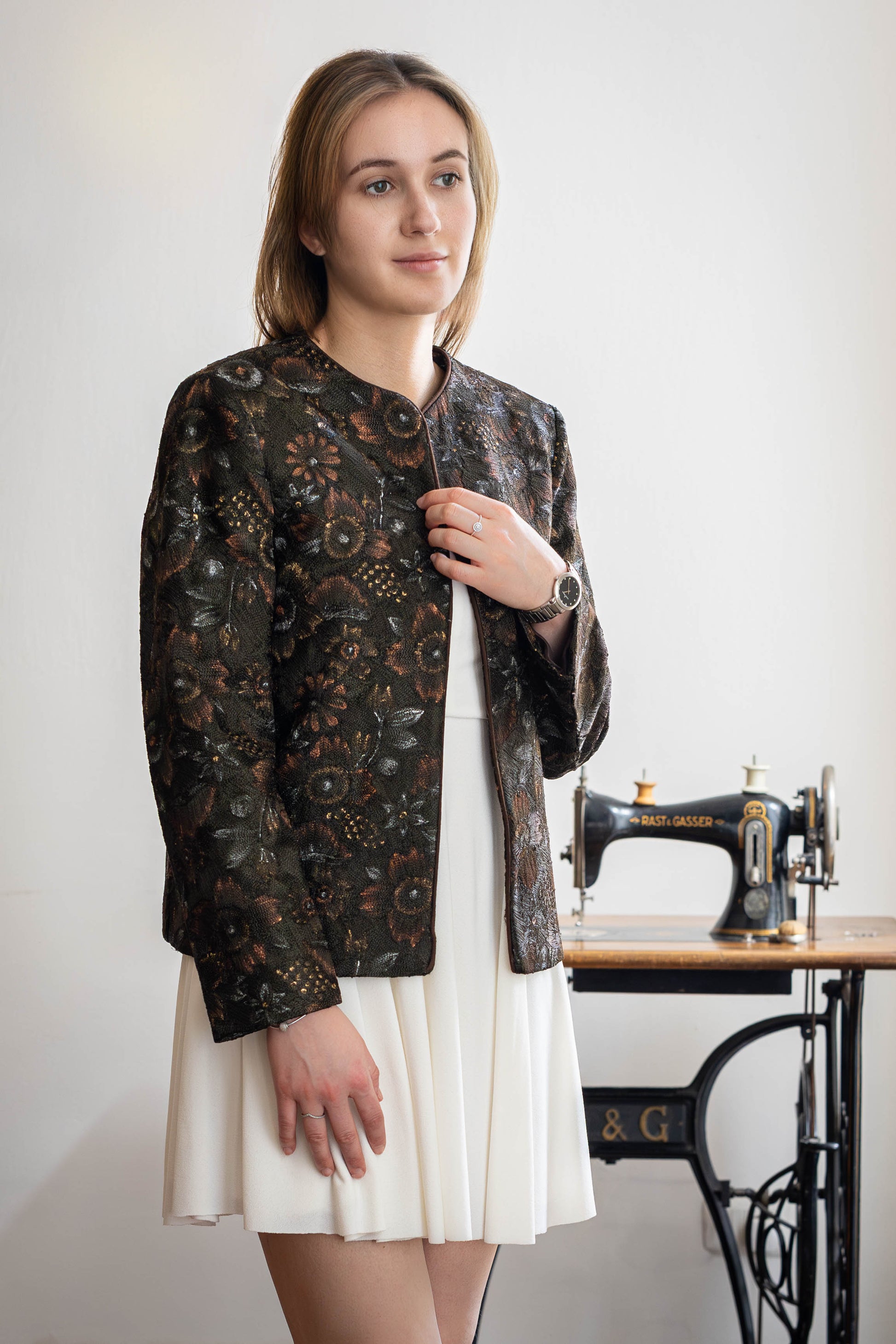 Model wearing handcrafted Aari embroidered jacket in pure silk – STOVARIA