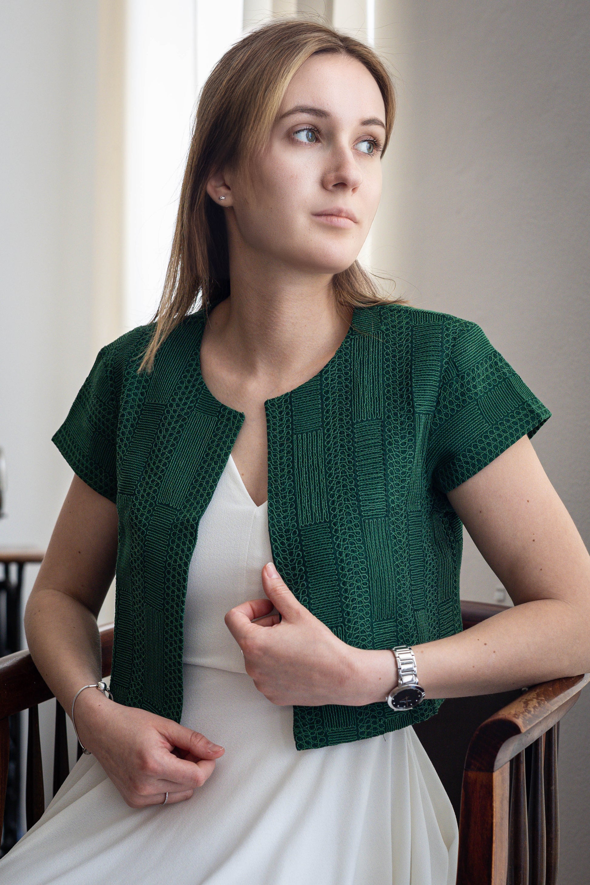 Green silk cropped coat with subtle thread embroidery