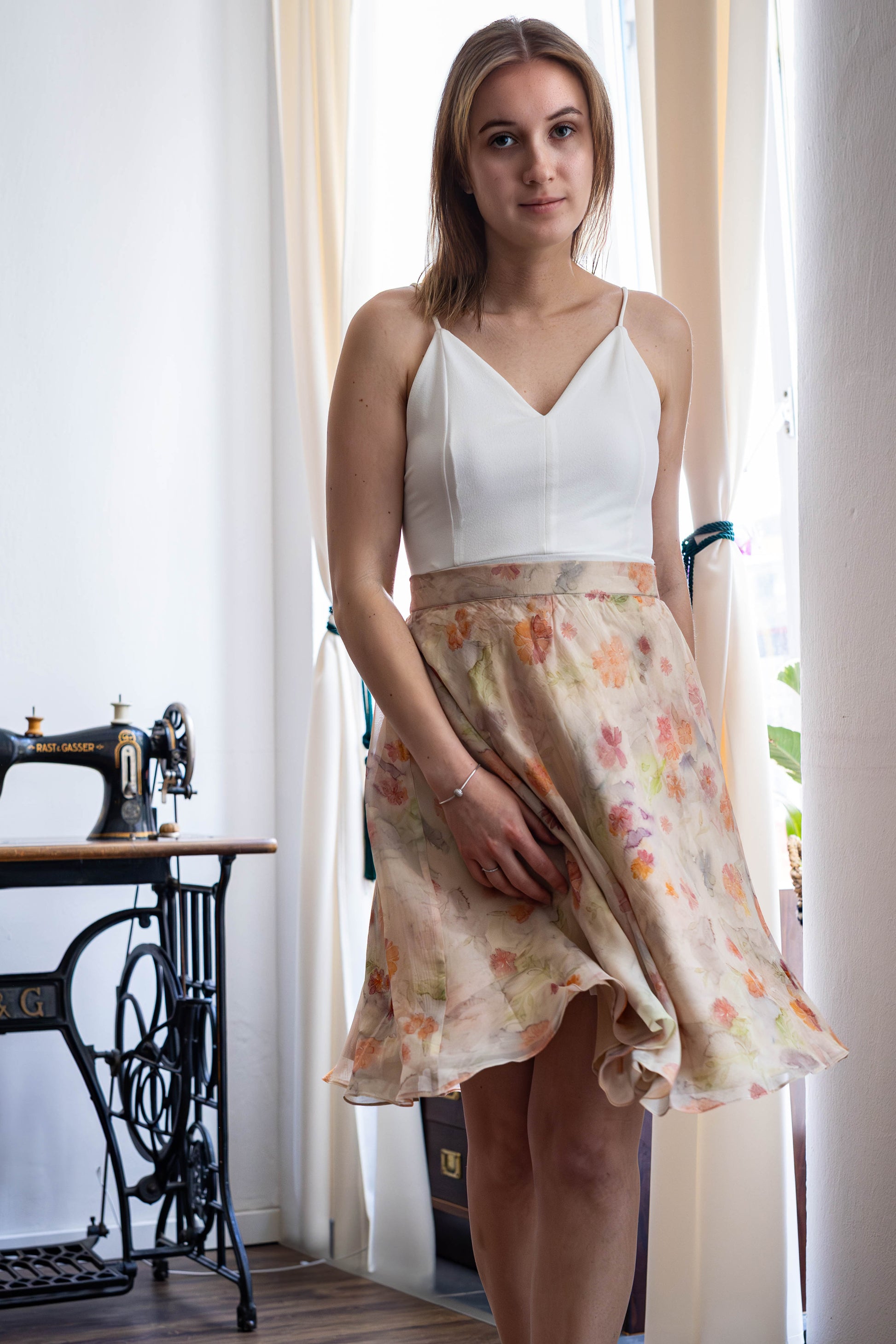 Pastel pink organza silk skirt with soft floral print