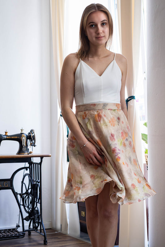 Pastel pink organza silk skirt with soft floral print