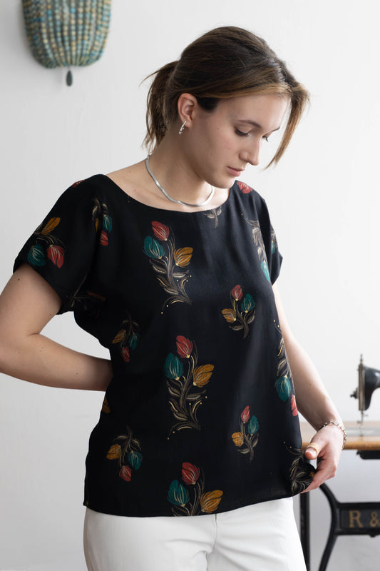 STOVARIA black cotton-silk floral blouse with tulip print, model wearing XS