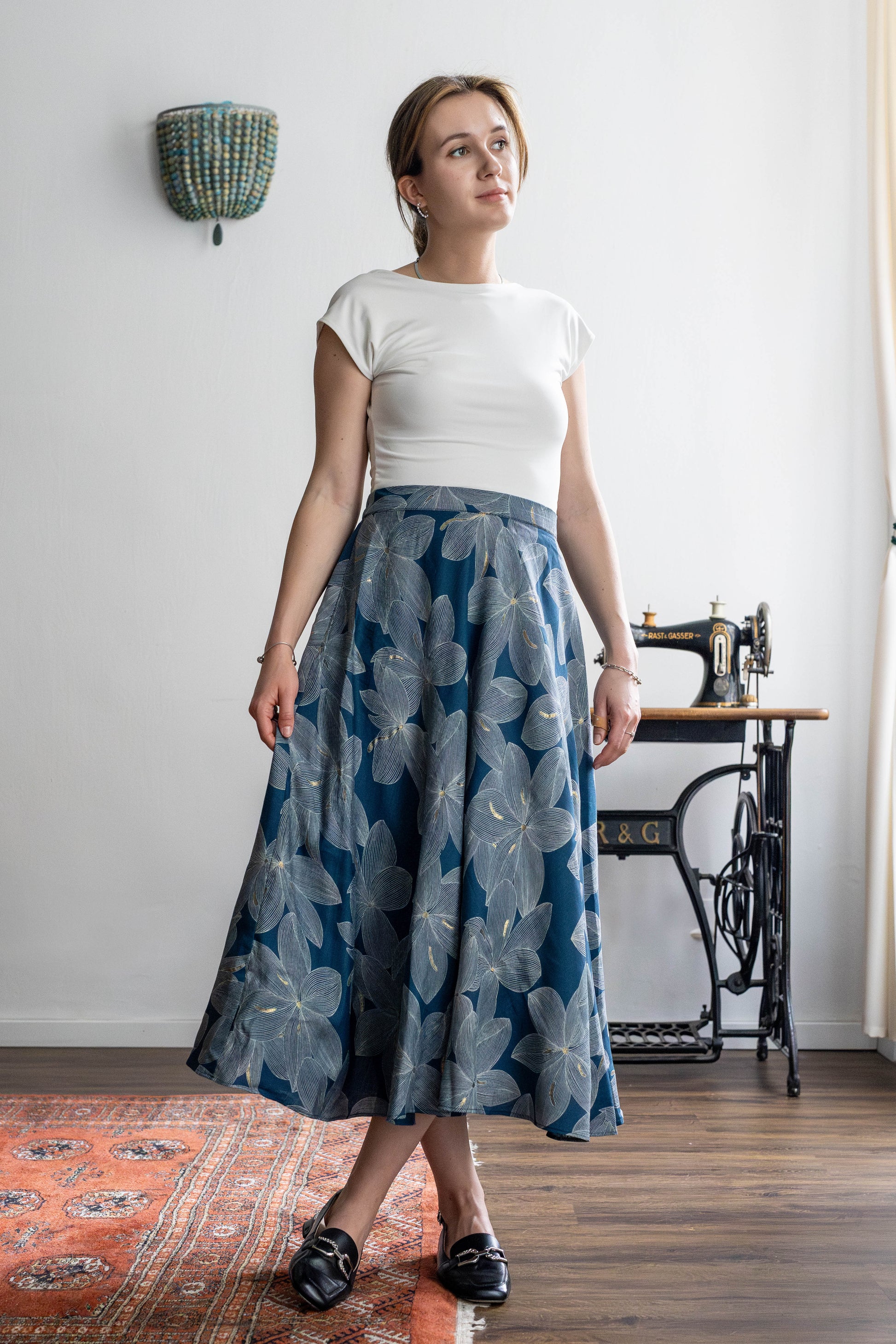 Deep blue cotton skirt with botanical print and flare