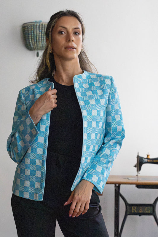 Model wearing handcrafted blue cotton jacket with gold zari embroidery – STOVARIA