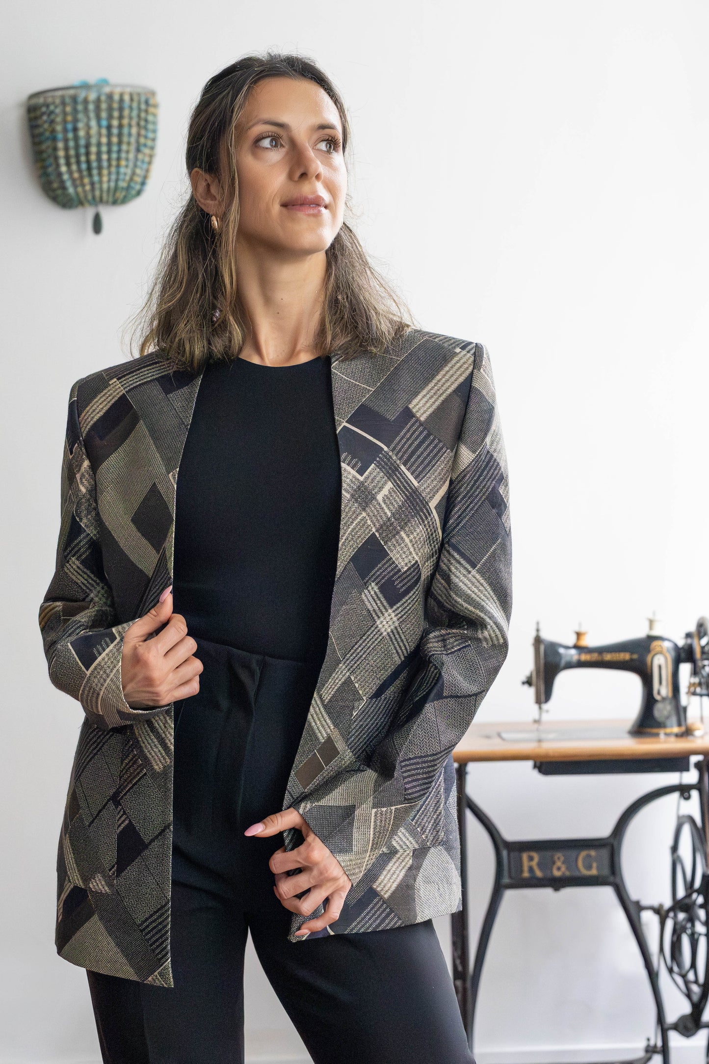 Model wearing unisex tussar silk blazer with graphic checks – STOVARIA