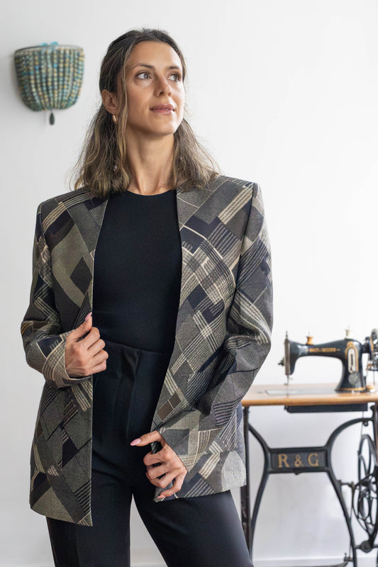 Model wearing unisex tussar silk blazer with graphic checks – STOVARIA