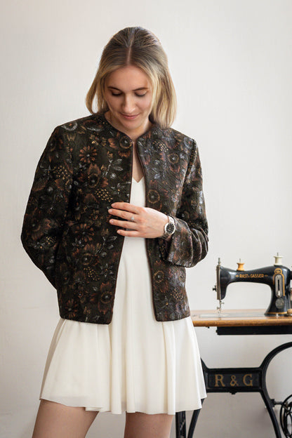 Model wearing handcrafted Aari embroidered jacket in pure silk – STOVARIA