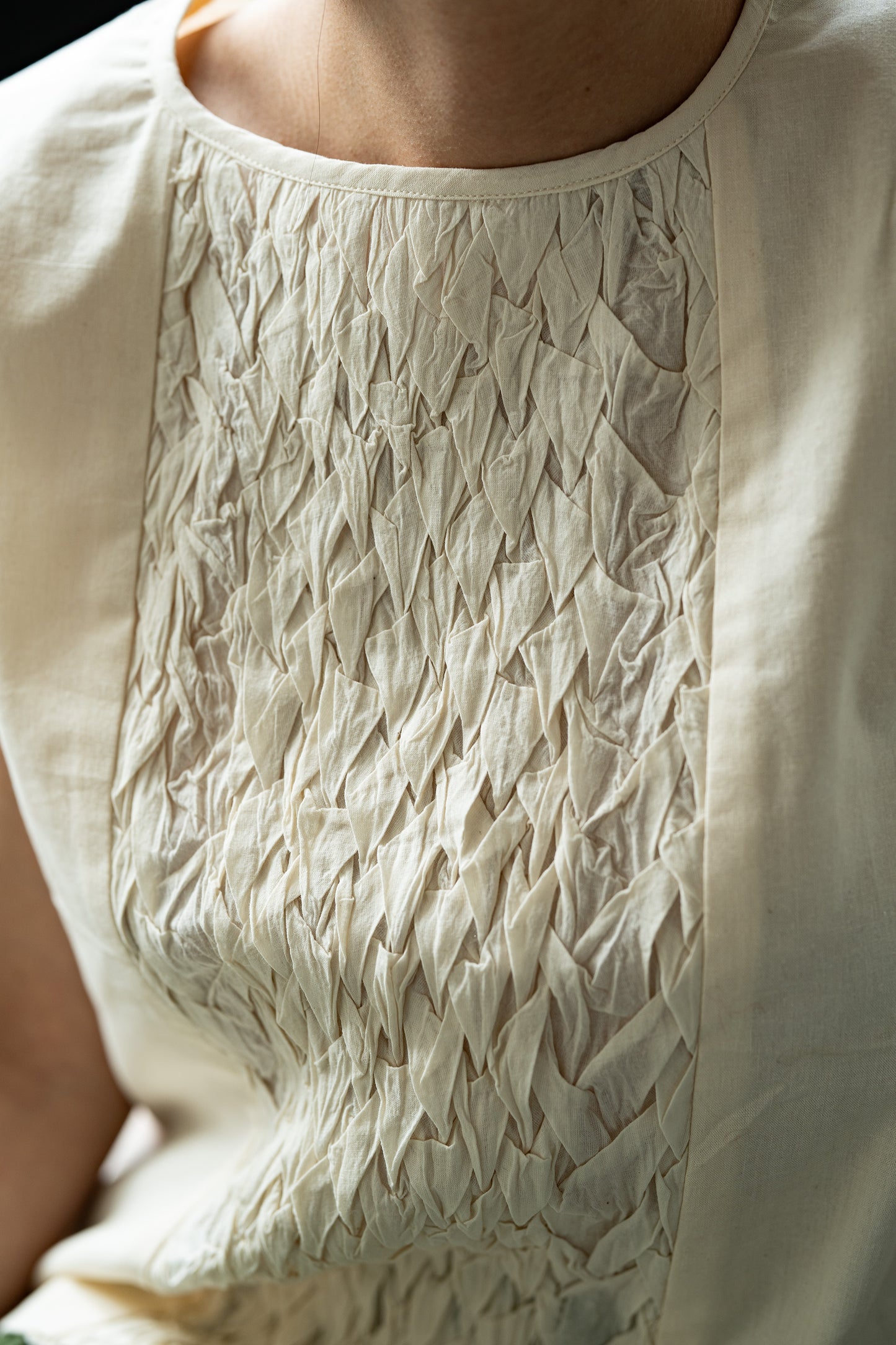Hand-Stitched Cotton Panel Statement Sleeveless Top in off white