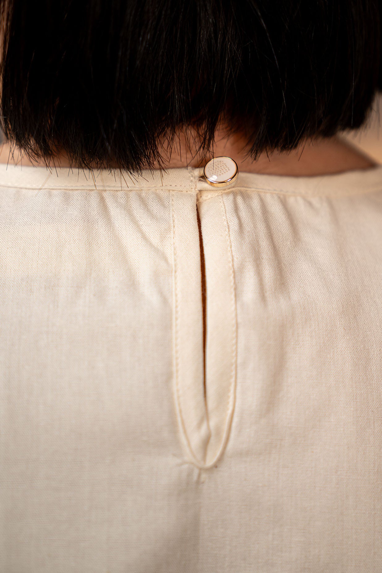 Hand-Stitched Cotton Panel Statement Sleeveless Top in off white